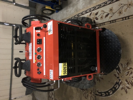 Stand behind skid Steer