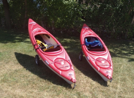 2 Pelican Kayaks w Carts Paddles